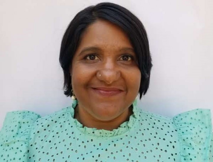 headshot of Aarati Kasturirangan with a turquoise shirt