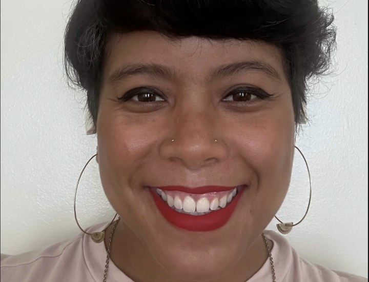 Headshot of Issa Victoria Guzman smiling
